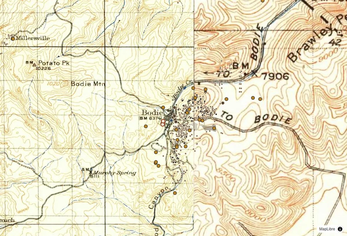 The Pro map at Bodie: the 1909 survey swiped against today's imagery, with mine features and cemeteries marked